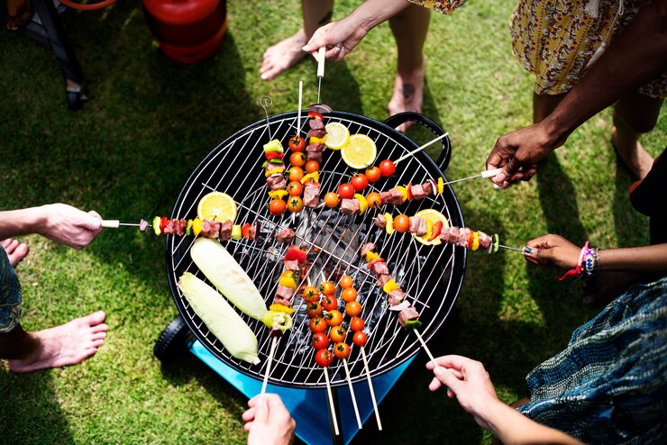 group of friends grilling barbecue